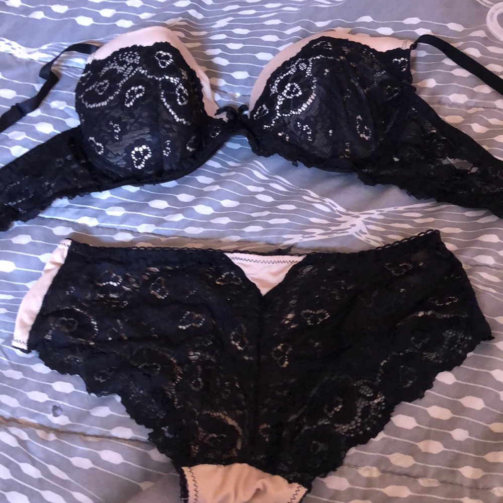 A black and beige bra and underwear set.